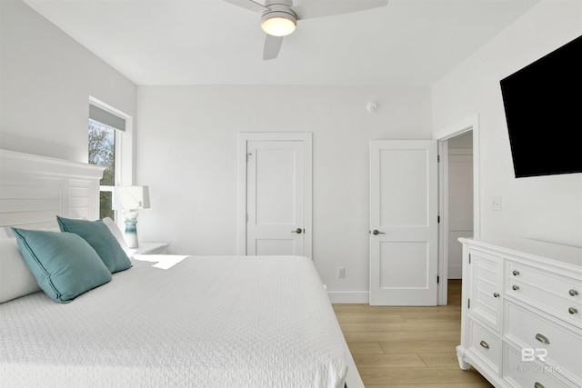 bedroom featuring ceiling fan and light wood-type flooring