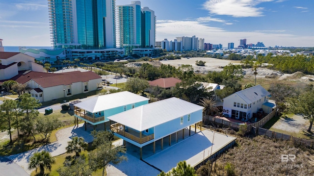 birds eye view of property with a city view