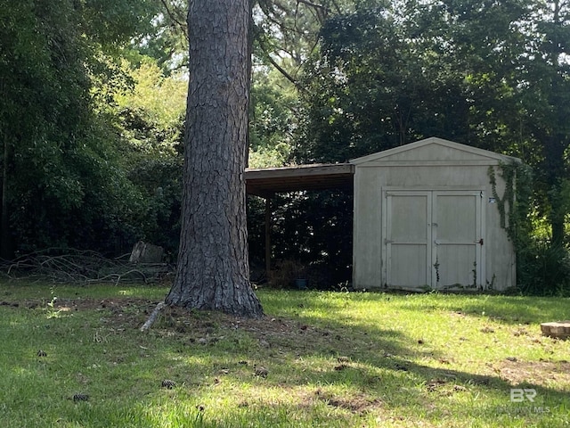 view of shed featuring a wooded view