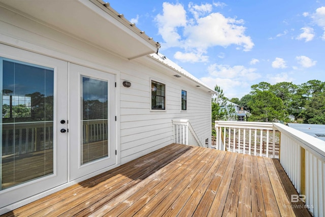 26498 Carondelette Dr, Orange Beach, AL 36561 - wooden deck with french doors
