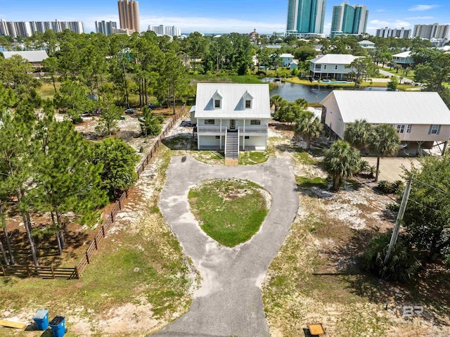 26498 Carondelette Dr, Orange Beach, AL 36561 - drone / aerial view of a skyline view, a large body of water, and a tree filled landscape