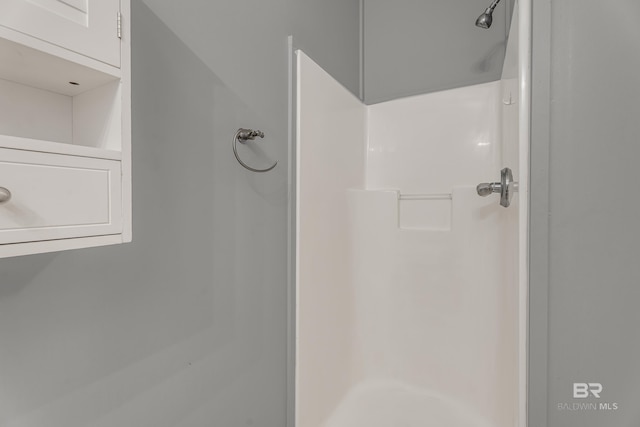 bathroom featuring a shower