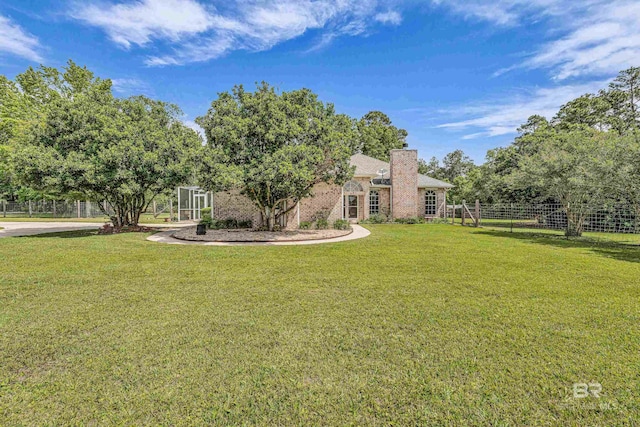 view of yard featuring fence