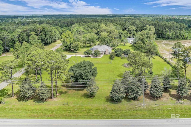 aerial view featuring a view of trees