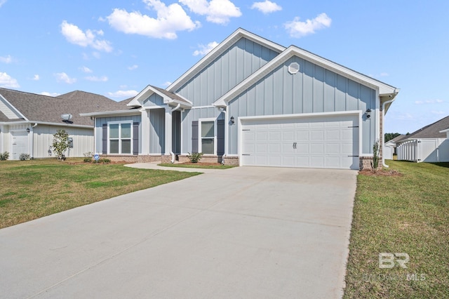 view of front of property with brick siding, an attached garage, board and batten siding, a front yard, and driveway