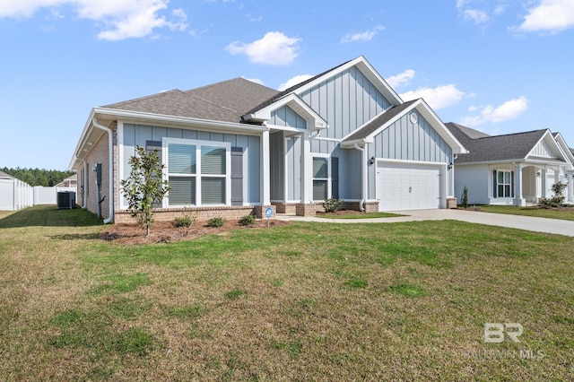 view of front facade featuring brick siding, central air condition unit, an attached garage, board and batten siding, and a front lawn