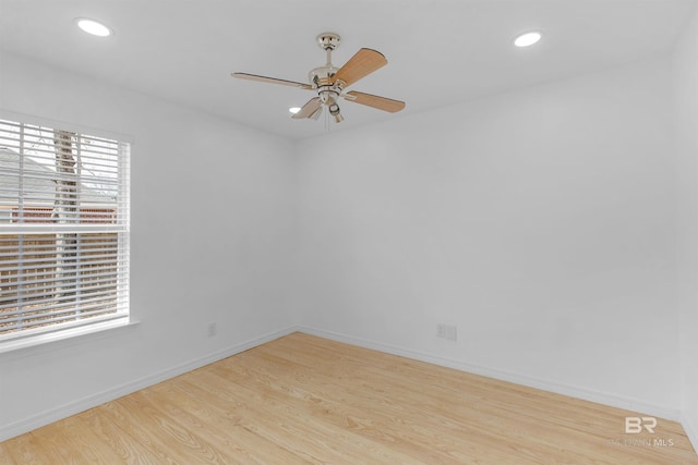 unfurnished room with light hardwood / wood-style floors and ceiling fan