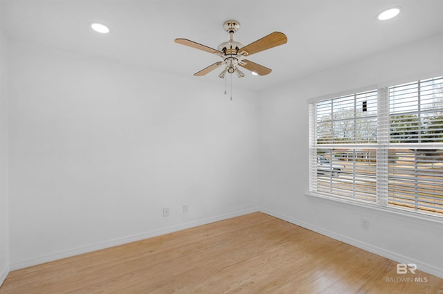 unfurnished room with light hardwood / wood-style floors and ceiling fan