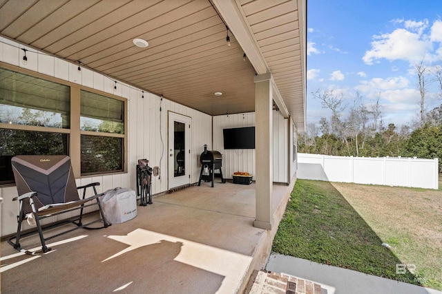 view of patio with a grill