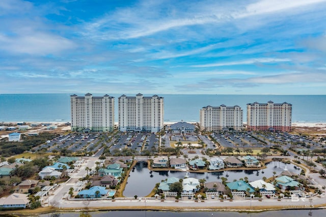 drone / aerial view with a water view and a city view