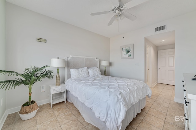 bedroom with light tile patterned floors, baseboards, visible vents, and ceiling fan