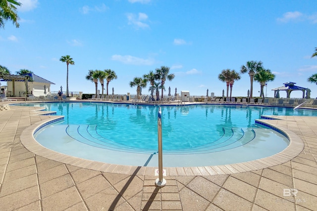 pool featuring a patio area