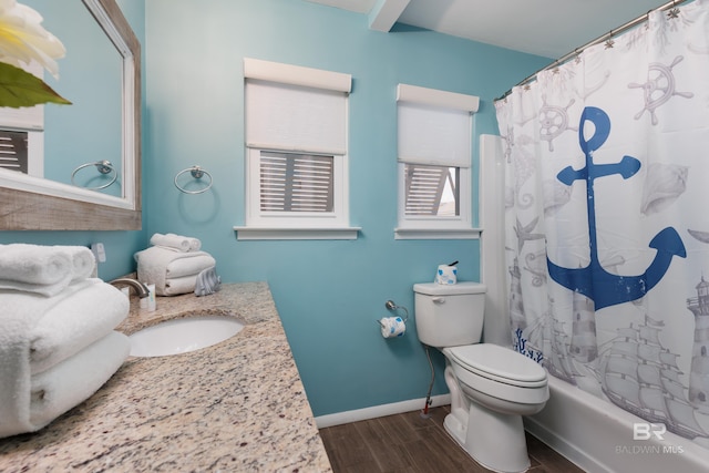 full bathroom with toilet, shower / tub combo with curtain, vanity, and hardwood / wood-style flooring