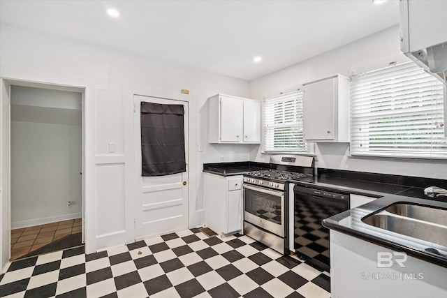 kitchen featuring white cabinets, gas range, sink, and dishwasher