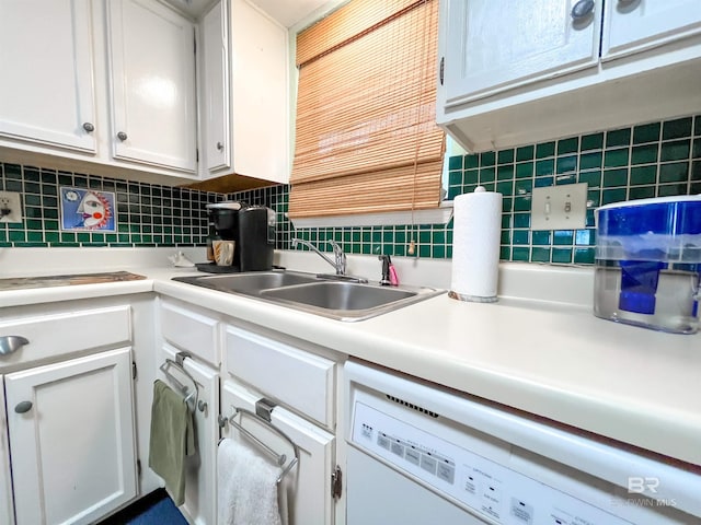 kitchen featuring dishwasher, white cabinetry, and decorative backsplash