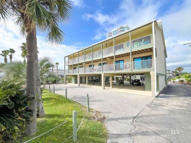 view of building exterior with a carport