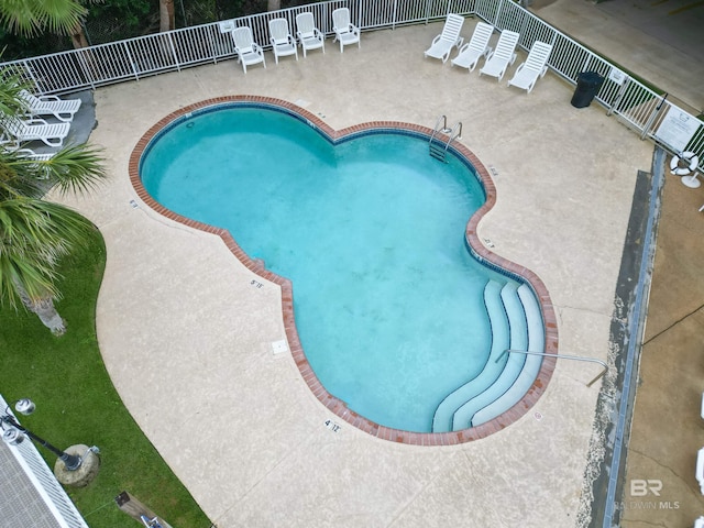 view of pool featuring a patio area