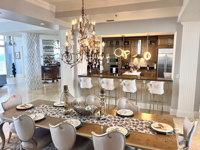 tiled dining space with crown molding and a chandelier