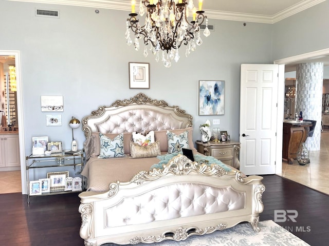 bedroom featuring a notable chandelier, ornamental molding, and tile patterned flooring