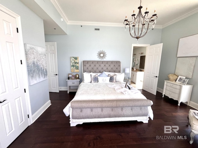 bedroom featuring dark hardwood / wood-style floors, a notable chandelier, and ornamental molding