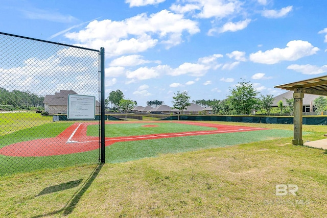 view of property's community featuring a yard