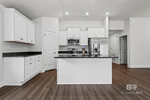 1311 Plymouth Dr, Foley, AL 36535 - kitchen featuring stainless steel appliances, baseboards, white cabinetry, dark wood-style floors, and recessed lighting