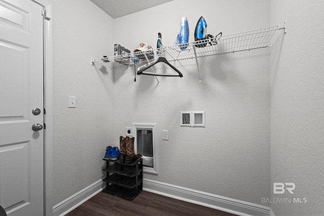 1311 Plymouth Dr, Foley, AL 36535 - washroom with washer hookup, baseboards, dark wood-type flooring, and hookup for an electric dryer