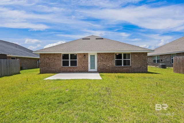 1311 Plymouth Dr, Foley, AL 36535 - back of house featuring a patio, cooling unit, a shingled roof, and brick siding