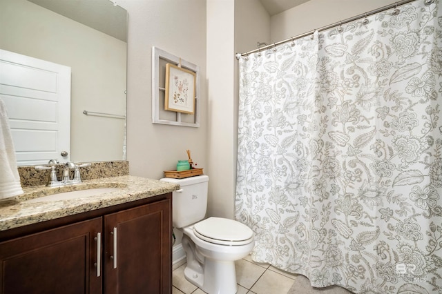 bathroom featuring a shower with curtain, vanity, toilet, and tile patterned floors