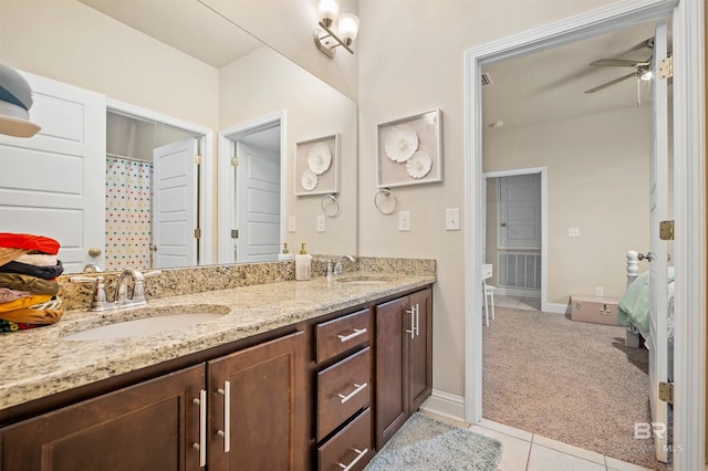 bathroom with vanity, ceiling fan, and tile patterned floors