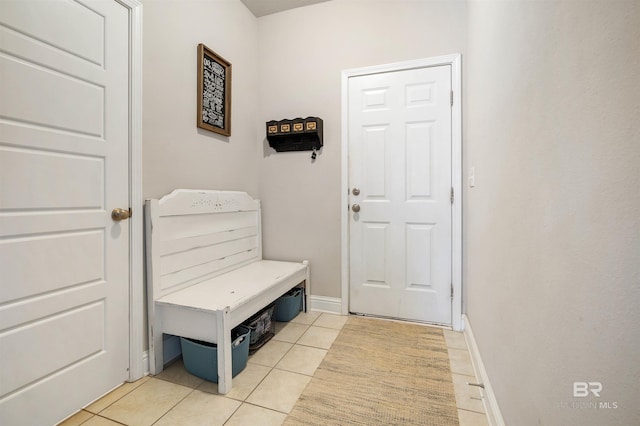 mudroom with light tile patterned floors