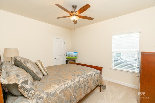 bedroom with carpet and ceiling fan