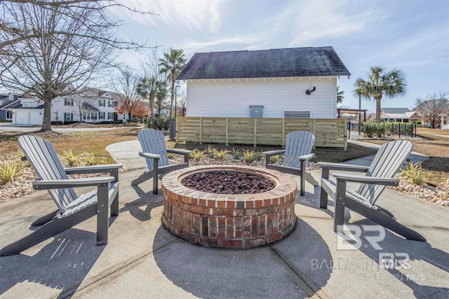 view of patio with a fire pit