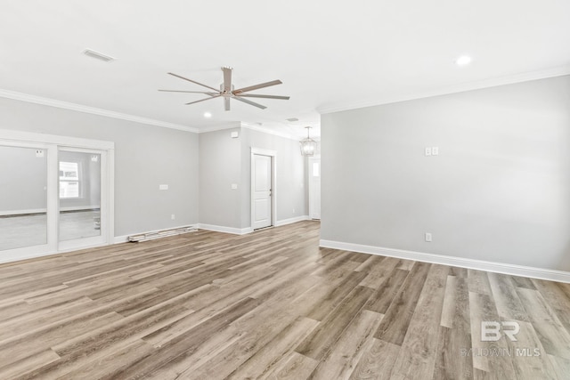 unfurnished room featuring ceiling fan, light hardwood / wood-style flooring, and crown molding