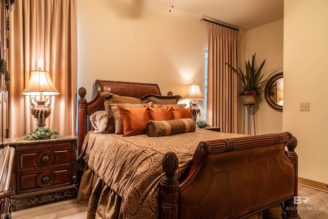 1430 Regency Rd Unit J302, Gulf Shores, AL 36542 - bedroom with wood finished floors