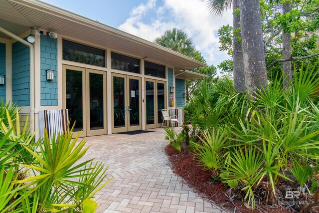1430 Regency Rd Unit J302, Gulf Shores, AL 36542 - doorway to property featuring french doors