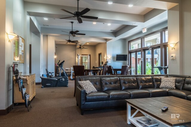 1430 Regency Rd Unit J302, Gulf Shores, AL 36542 - living area with ceiling fan, dark carpet, recessed lighting, and a towering ceiling