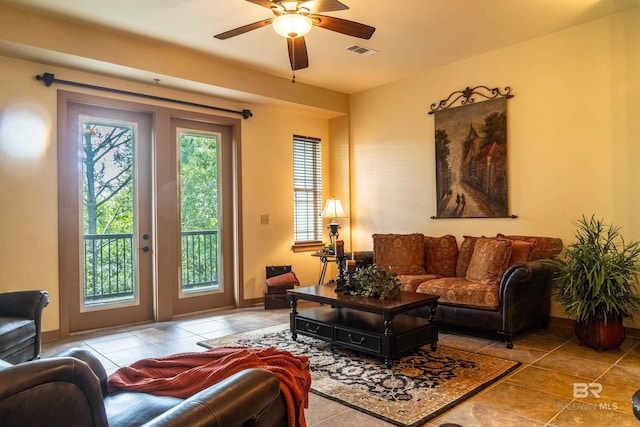 1430 Regency Rd Unit J302, Gulf Shores, AL 36542 - living area with a ceiling fan and baseboards