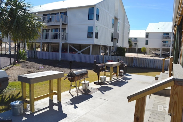 surrounding community featuring a patio