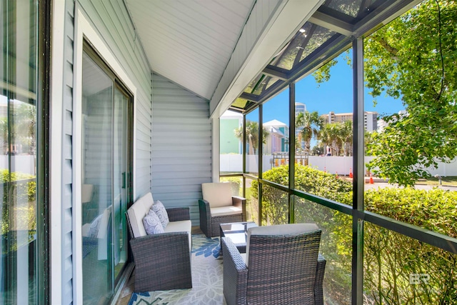 sunroom with lofted ceiling