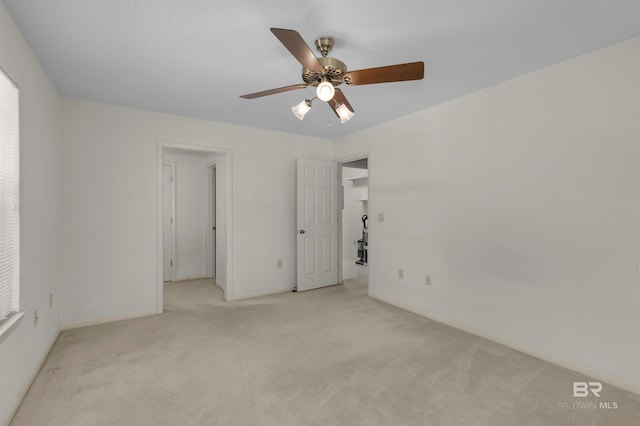 143 Kingswood Dr, Daphne, AL 36526 - unfurnished bedroom with carpet, ceiling fan, and multiple windows