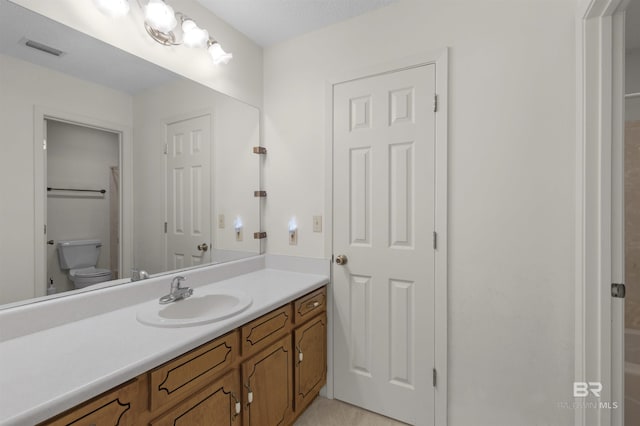 143 Kingswood Dr, Daphne, AL 36526 - bathroom featuring vanity and toilet