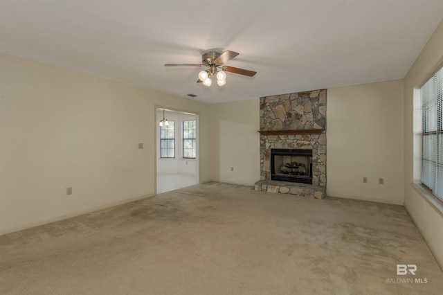 143 Kingswood Dr, Daphne, AL 36526 - unfurnished living room featuring a ceiling fan, a fireplace, and carpet