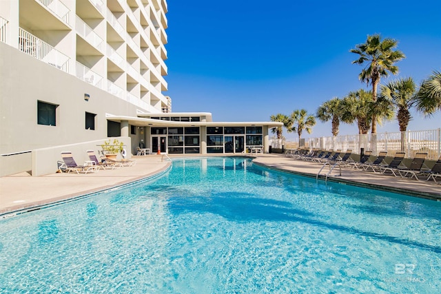 view of pool featuring a patio