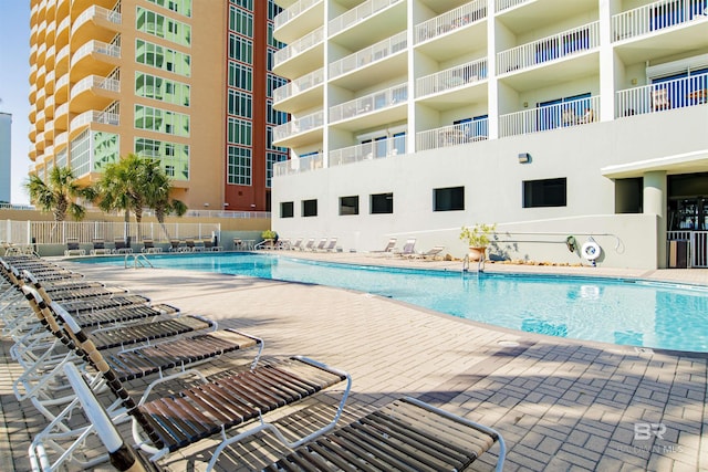 view of pool featuring a patio area