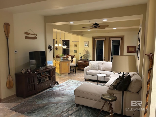 living room featuring ceiling fan