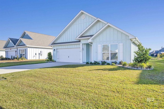 view of front facade with a garage and a front lawn