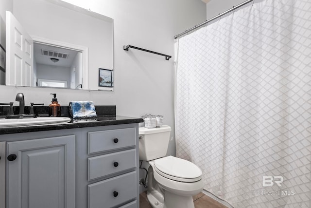 full bathroom with visible vents, toilet, tile patterned flooring, and vanity