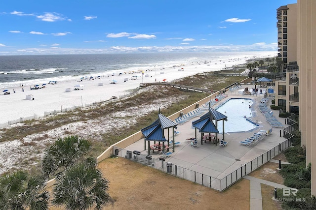drone / aerial view with a view of the beach and a water view