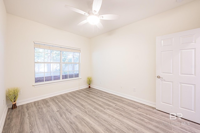 spare room with ceiling fan and light hardwood / wood-style flooring